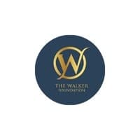 Navy and gold circular logo for The Walker Foundation with an ornate monogram 'W'.